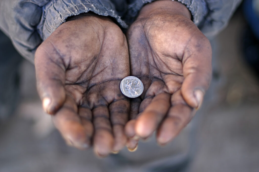 beggar in street morality of charity